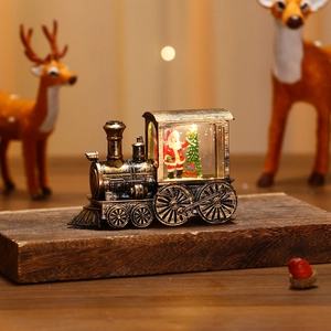 Vintage bronze train lantern with Santa Claus scene and warm glowing LED light