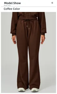 Detail of coffee brown joggers featuring an elastic waistband with adjustable drawstrings