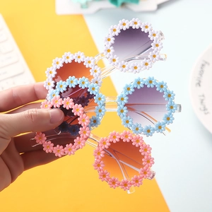 Kids daisy flower sunglasses and hollow headband set in vibrant candy colors