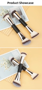 Close-up of dual-ended makeup brushes with angled and round heads on warm background