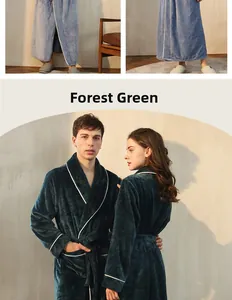 Detail of forest green flannel robe featuring white piping and plush fleece texture
