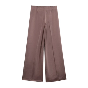 Detail of high-waist satin wide-leg trousers with silky texture in dark mauve brown