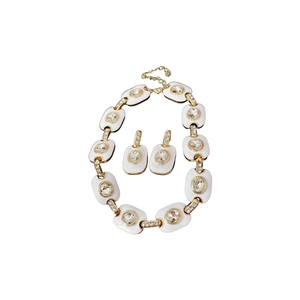 Parure bijoux vintage dorée avec collier en cristal et boucles d'oreilles ovales