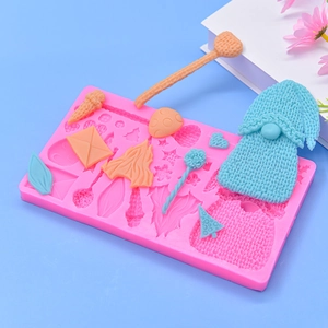 Pink silicone mold for DIY Christmas gnome and snowflake fondant baking crafts