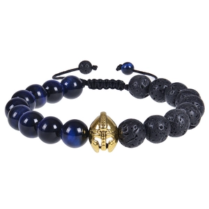 Detail of blue tiger eye and lava stone beads with a golden Spartan helmet charm