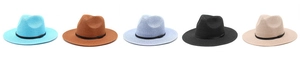 Detailed view of woven Panama hats in blue brown purple black and beige colors