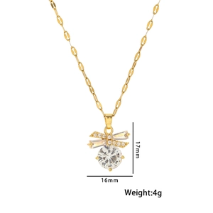 Gold titanium bow pendant necklace with crystal drops measuring 17mm by 16mm and 4g