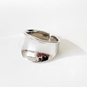 Minimalist wide silver irregular open ring with a polished mirror finish surface