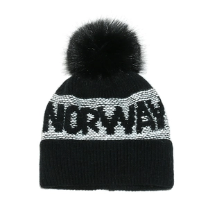 Close-up of Norway jacquard knit pattern and ribbed cuff on winter beanie hat