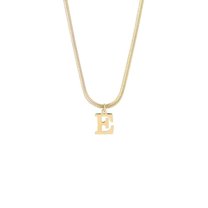 Detail of 18K gold letter E pendant on a minimalist flat snake chain necklace