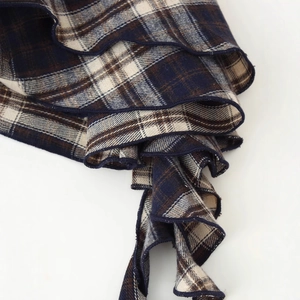 Plaid plaid camisole with layered ruffles and classic blue check pattern detail