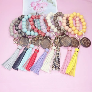 Bracelet porte-clés perles léopard avec pompon en cuir et breloque MAMA bois
