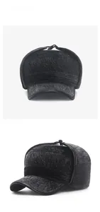 Detail view of winter faux fur earflap hat with thick plush lining and leather trim