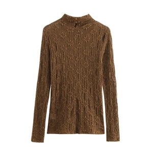 Women's brown long-sleeve lace turtleneck top with intricate hollow knit design