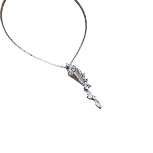 Elegant silver necklace with a tapered hourglass zircon pendant on a white background