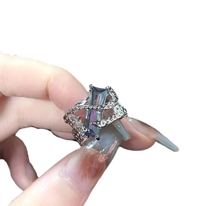 Irregular silver thorn ring featuring a large rectangular gradient purple and green gemstone