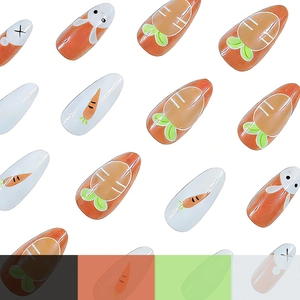 Long almond press-on nails featuring cute Easter bunny and carrot designs on white background