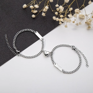 Minimalist magnetic heart couples bracelets in silver finish with rectangular nameplates
