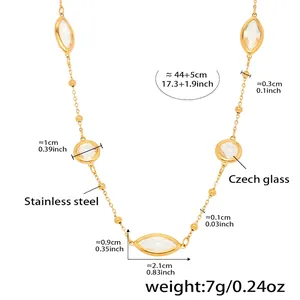 Detailed view of faceted glass stones on a 18k gold plated stainless steel chain