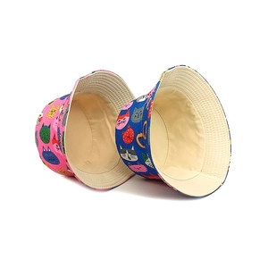 Kids reversible bucket hats with cute cartoon cat prints in pink and blue canvas colors