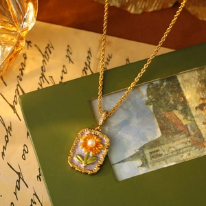 Vintage gold necklace featuring a sunflower oil painting pendant with freshwater pearls
