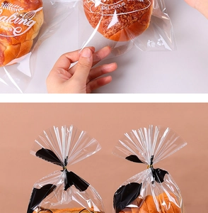 Close-up of transparent bakery bags with printed patterns showing fresh bread inside
