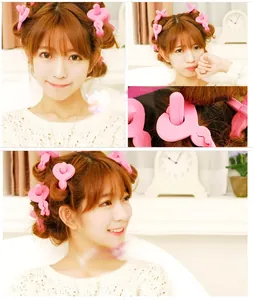 Detailed view of pink hair styling clips on a model for DIY hair styling and buns