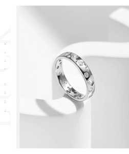 Detailed macro view of S925 sterling silver geometric ring with shimmering cubic zirconia