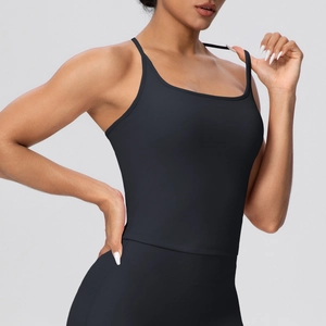 Detail of black sports bra with thin straps and square neckline for yoga and fitness