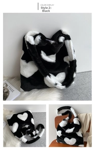 Detail of plush faux fur tote bag with heart pattern and wide shoulder strap