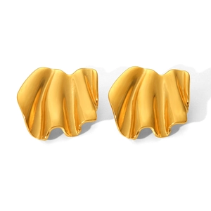 Macro shot of gold stainless steel earrings with elegant pleated geometric texture
