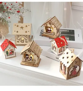 Close-up of Nordic wooden Christmas houses with warm LED lighting and cutout designs