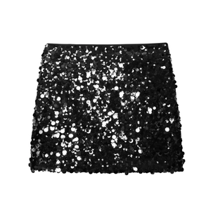 Close-up of shimmering black sequins on the fabric of this mini A-line skirt