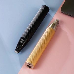 Tondeuse à pattes pour animaux rechargeable USB en noir et doré avec manche antidérapant