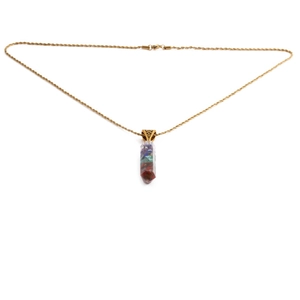 Gold twist chain necklace with a colorful hexagonal crystal pillar star pendant