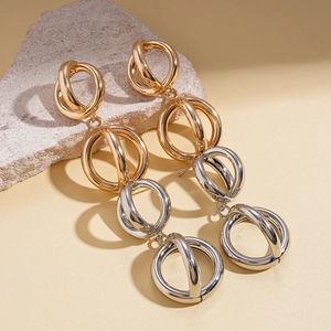 Minimalist interlocking geometric circle drop earrings in gold and silver finish