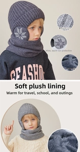 Detail of children's winter knit hat and neck warmer set with fleece lining and snowflake patterns