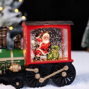 Festive Christmas train snow globe with Santa Claus, LED warm lights and swirling glitter