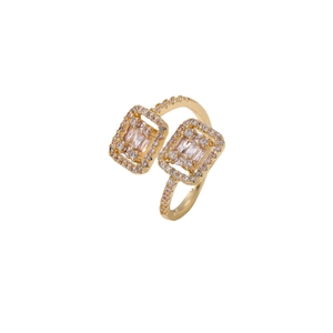 Exaggerated golden open ring with double square heads and pink zircon micro-pave setting