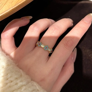 18k gold plated floral open ring with colorful zircon stones on model finger