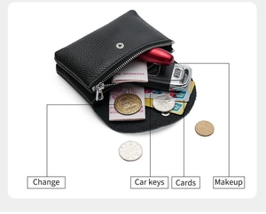 Leather coin purse detail showing storage for change, car keys, cards, and makeup