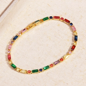 Detail of gold-plated bracelet featuring multi-color cubic zirconia and secure clasp