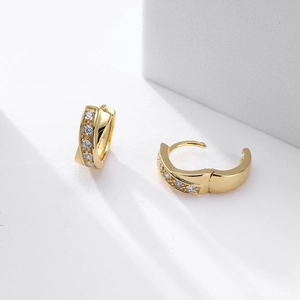 Close-up of gold-plated S925 silver hoop earrings with micro-pave cubic zirconia crystals