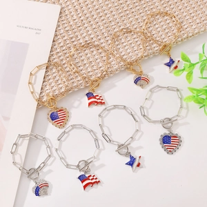Patriotic USA flag bracelets with heart and star charms on link chains and toggle clasps