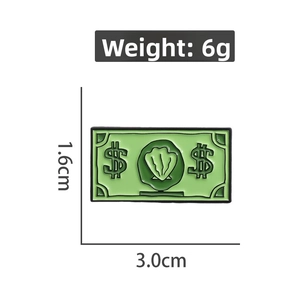 Détail du pin's émaillé en forme de billet avec dimensions 3,0 cm x 1,6 cm et 6 g