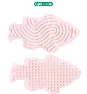 Macro view of fish-shaped light purple silicone sensory toy with textured massage patterns