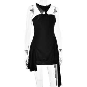 Detail of sexy backless halter dress in black with unique asymmetrical hemline design