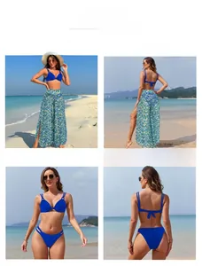 Detailed tile display of royal blue bikini and floral high-slit beach trousers set