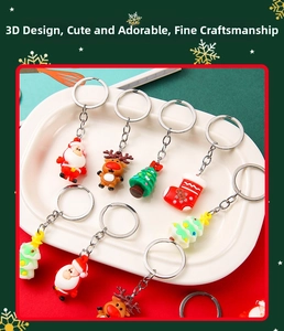 Detailed view of 3D Christmas keychains with Santa and Reindeer in a festive setting