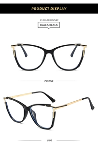 Detail view of black cat-eye TR90 frames with elegant gold metal temple hinges